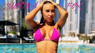 Monika Fox Poses In Pink Bikini And Swims In Pool Surrounded By Skyscrapers